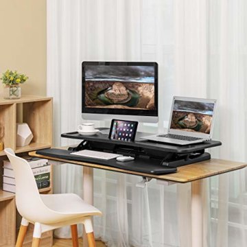 SONGMICS Höhenverstellbarer Sitz-Steh-Schreibtisch, Ergonomischer Schreibtisch Konverter Für Computer, Laptop, Mit Abnehmbarer Tastaturablage, Großer Schreibtischaufsatz 95 x 40 cm , Schwarz LSD06BK - 6